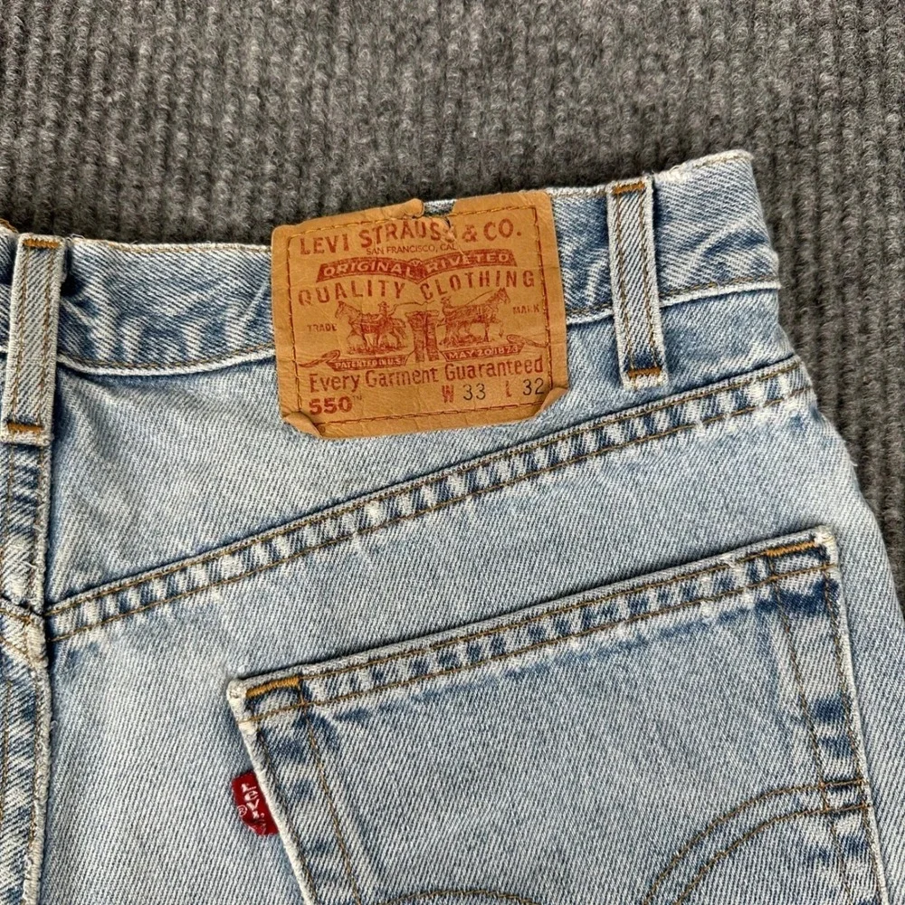Vintage‎ 90s Levi's 550 Relaxed Fit Jeans Mens 33x32 Light Wash Distressed Denim